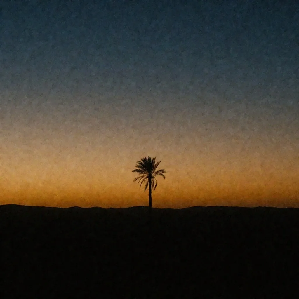 Palm tree against dusk sky